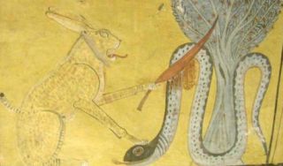 Tefnout est la d�esse de l'humidit� et de la ros�e. Sa t�te de lion fait r�f�rence � l'apparence qu'elle rev�tit lorsqu'elle s'enfuit en Nubie laissant derri�re elle une grande s�cheresse.